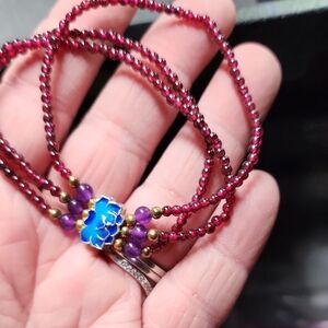 Elegant Beaded Necklace with Blue and Purple Accents